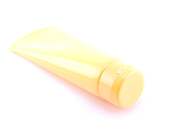 Single cosmetics tube isolated on white background