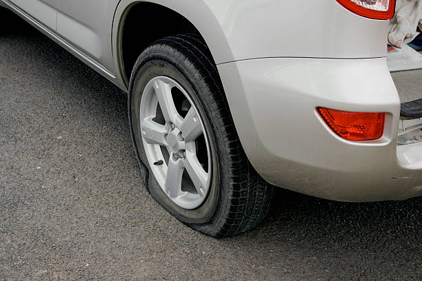 flat tire flat tire flat tire stock pictures, royalty-free photos & images