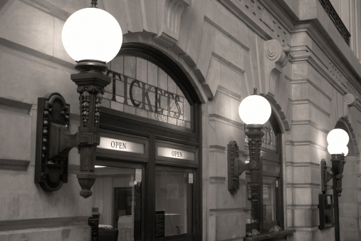 Black and white photograph of an historic train station ticket booth