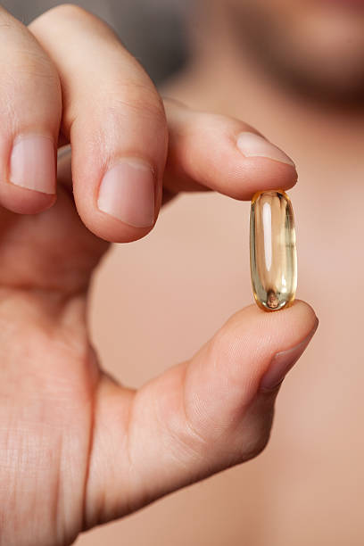 istock Omega 3 fish oil capsule 182821777