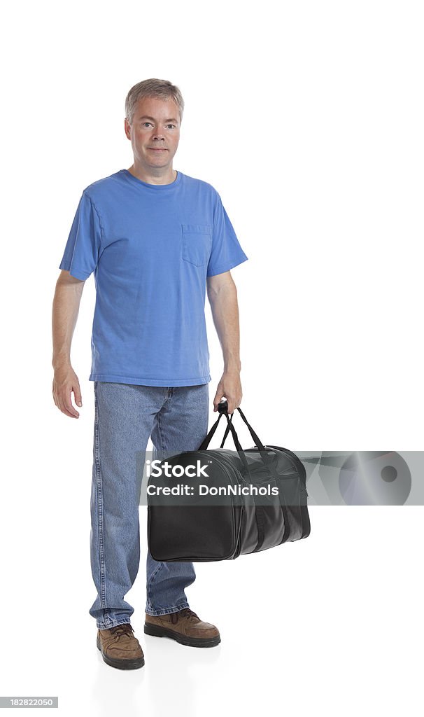 Uomo portando con sé una borsa nera - Foto stock royalty-free di Uomini