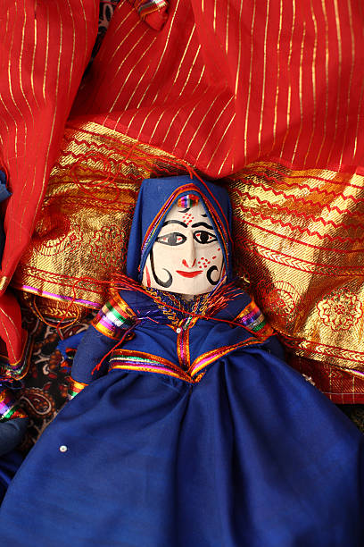 Indian Folk Dolls Indian puppet dolls in the outdoor market in Agra. doll puppet indian culture small stock pictures, royalty-free photos & images