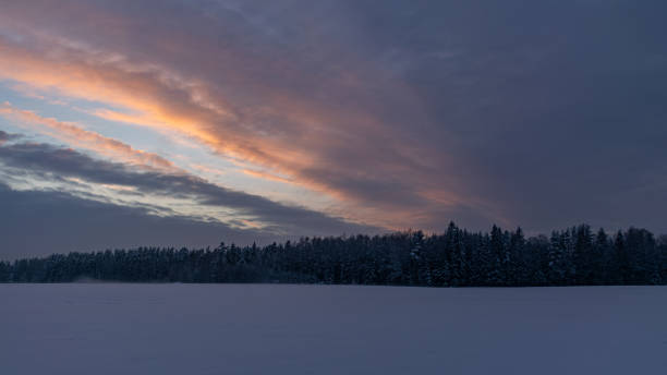 istock gorgeous sunset sky, beautiful winter landscape, blue hour, dusk 1828223719