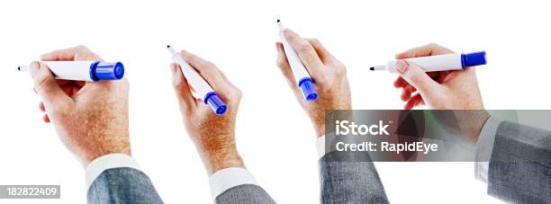 Isolated Hands Holding Blue Felttipped Pens Against White Stock Photo - Download Image Now