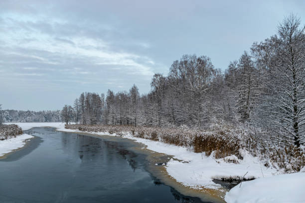 istock river in winter, sunset sky, beautiful winter landscape, blue hour, dusk 1828225878