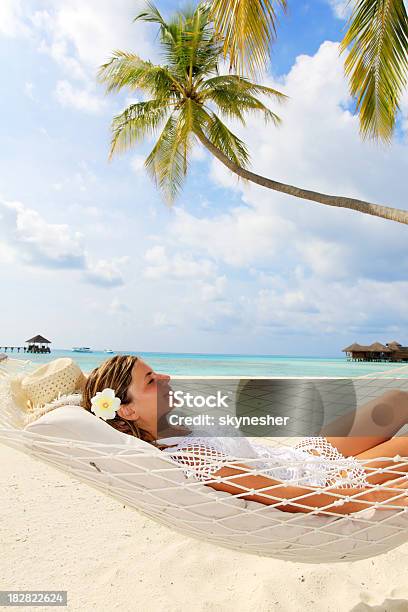 Young Woman Resting In A Hammock Stock Photo - Download Image Now - Adult, Adults Only, Bay of Water