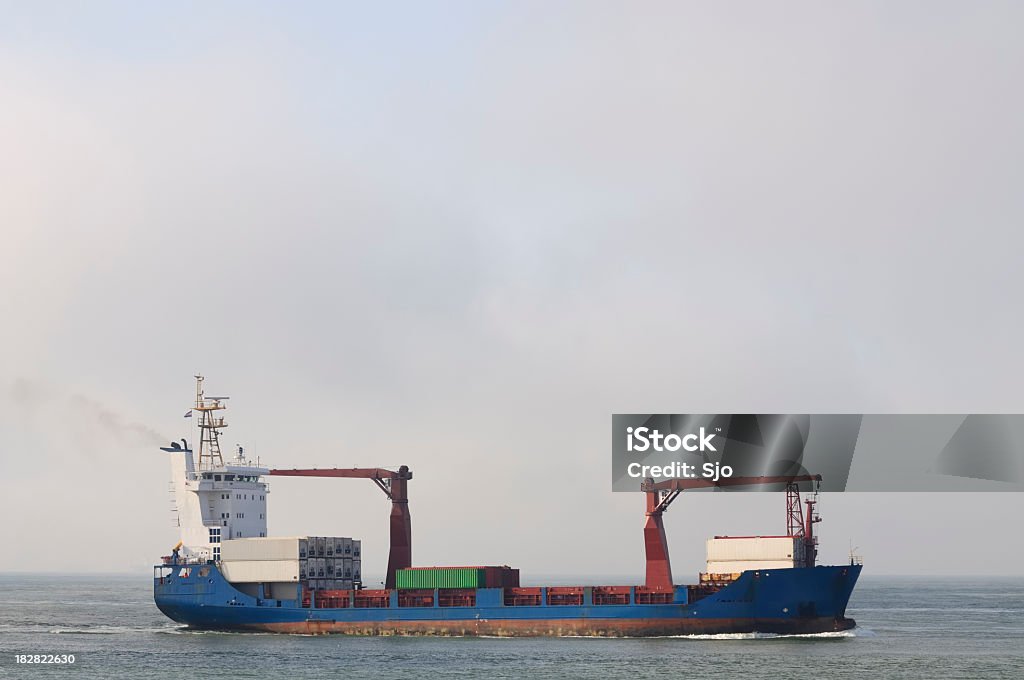 Container ship Large container ship entering the port of Rotterdam from the North Sea. Business Stock Photo
