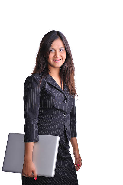istock Indian executive with laptop smiling 182823015