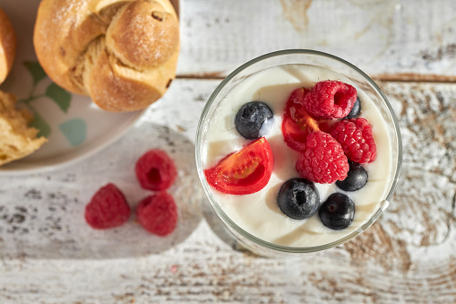 healthy eating:  yogurt, fruit and bread