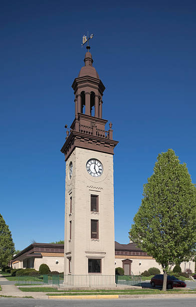 istock Clock Tower with Roman Numeral Clock Face and Weathervane 182823147