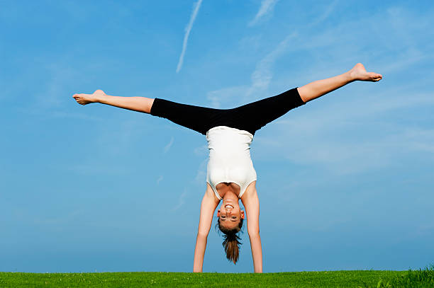 istock Girl Up-Side Down In The Nature.Color Image 182823190
