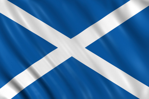 Flag of scotland waving with highly detailed textile texture pattern