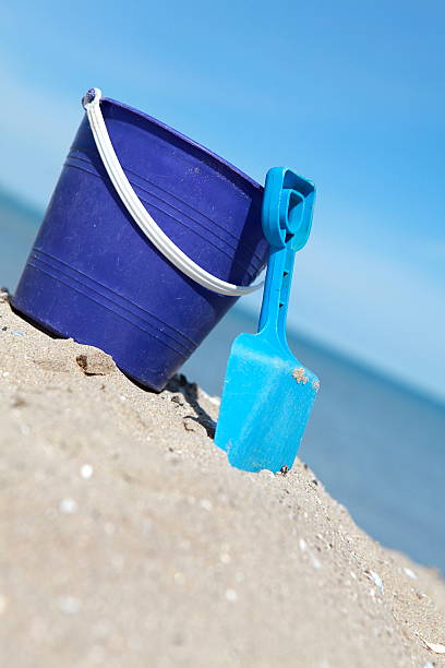 istock Toy Pail and Shovel in Sand at Beach 182825044