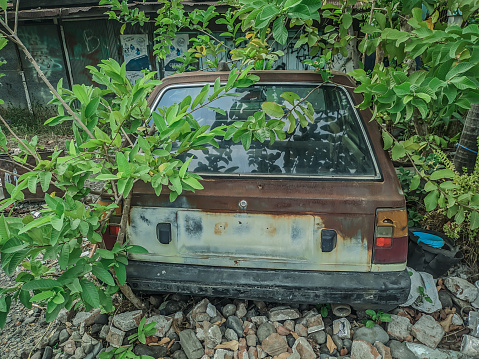 Rear of the car is rusty and damaged