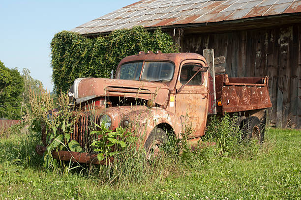 istock Abandoned Truck in front of Barn 182825909