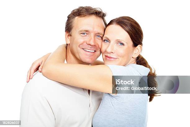 Mature Couple Hugging Against White Background Stock Photo - Download Image Now - 40-44 Years, Men, Women