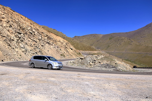 August 20 2023 - Too-Ashuu pass near Bishkek in Kyrgyzstan, Central Asia: people and cars cross the pass