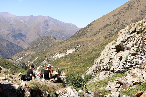 August 19 2023 - Ala Archa national park, Kyrgyzstan in Central Asia: people enjoy hiking in the Ala Archa national Park in summer