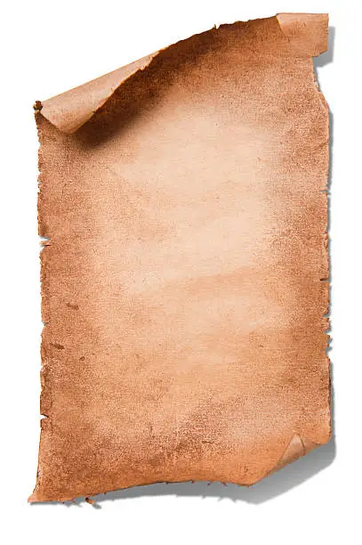 This is an aged piece of brown paper, slightly tattered and curled isolated on white.