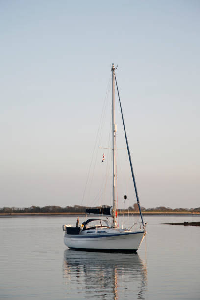 istock Anchored Yacht at Dusk 182826299