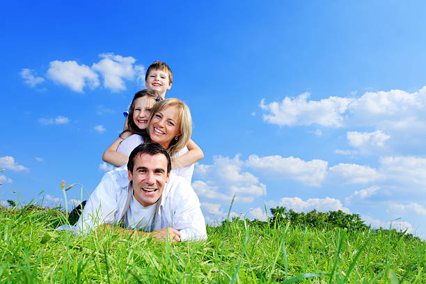 istock Beautiful happy family laying down one on another. 182826352