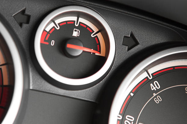 Close-up of the fuel gauge on a filled up car stock photo