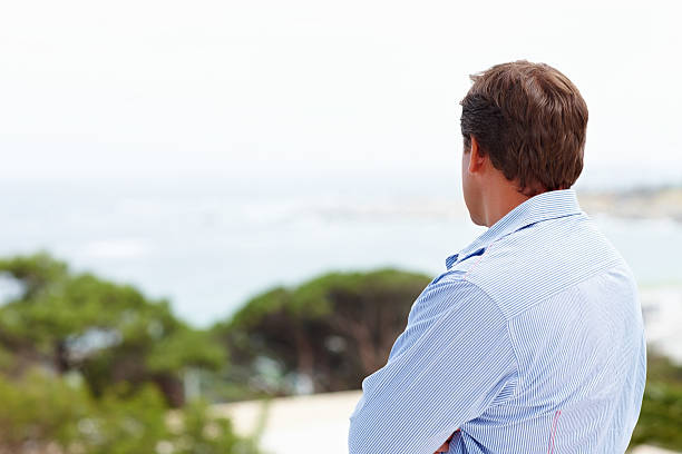 istock Rear view of a contemplative mature guy 182826617