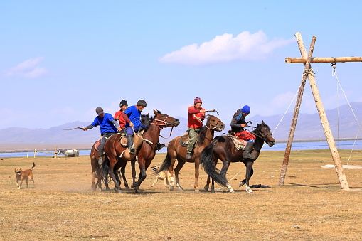 August 24 2023 - Song kol Lake in Kyrgyzstan: Locals play kok boru (ulak tartysh), traditional horse game, with leather dummy instead of a goat carcass