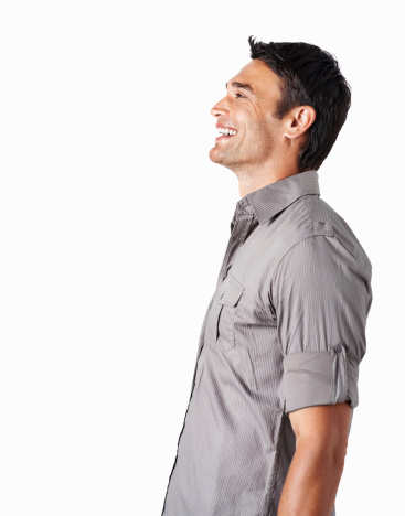 Profile of a smiling mid adult man against white background