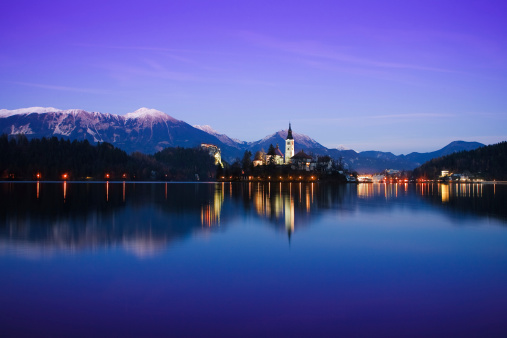 Lake Bled located in Slovenia Europe. There is a Church on the Island and ancient castle on top of a rock.Lake Bled located in Slovenia Europe. There is a Church on the Island and ancient castle on top of a rock.