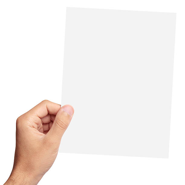 Blank paper in hand stock photo