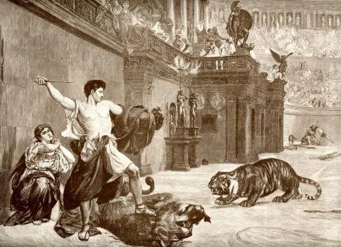 Vintage engraving of showing a man saving a woman from a lion and tiger in the Roman Arena.