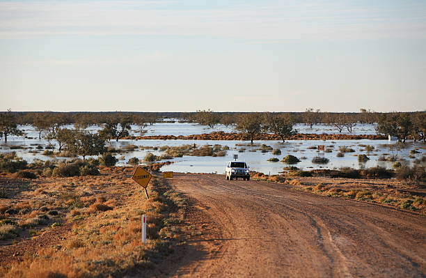 Birdsville track cooper creek flooded across the birdsville track queensland floods stock pictures, royalty-free photos & images