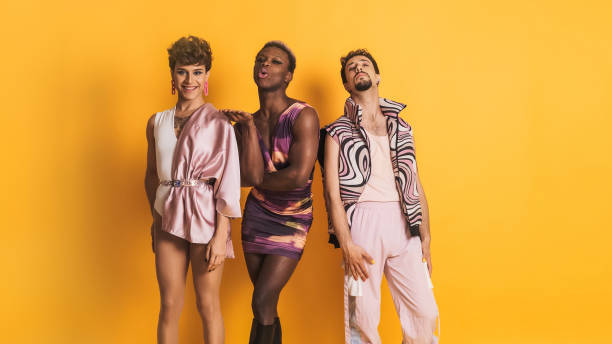 istock multiethnic LGBTQ people posing while smiling at the camera in a photographic studio 1828309896