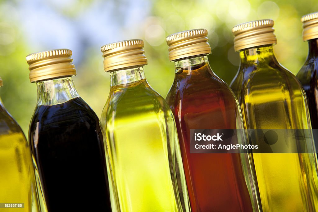 Different oils and vinegars Salad dressing Vinegar Stock Photo