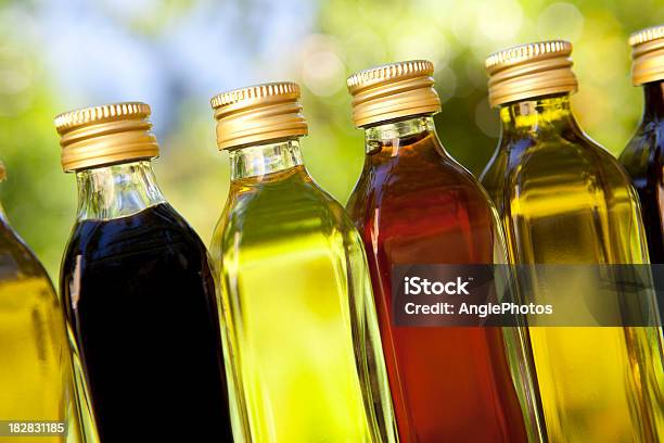 Different Oils And Vinegars Stock Photo - Download Image Now - Vinegar, Salad Dressing, Truffle Oil