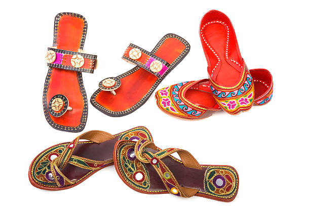 Handmade indian shoes Handmade indian shoes on white background handmade indian shoes on white stock pictures, royalty-free photos & images