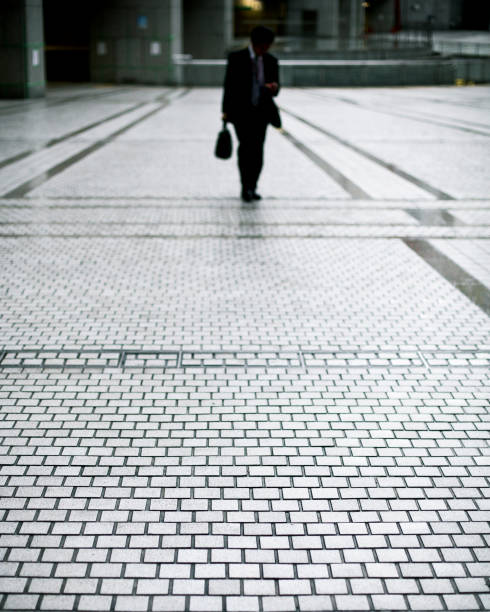istock Businessman Walking with His Briefcase 182832126