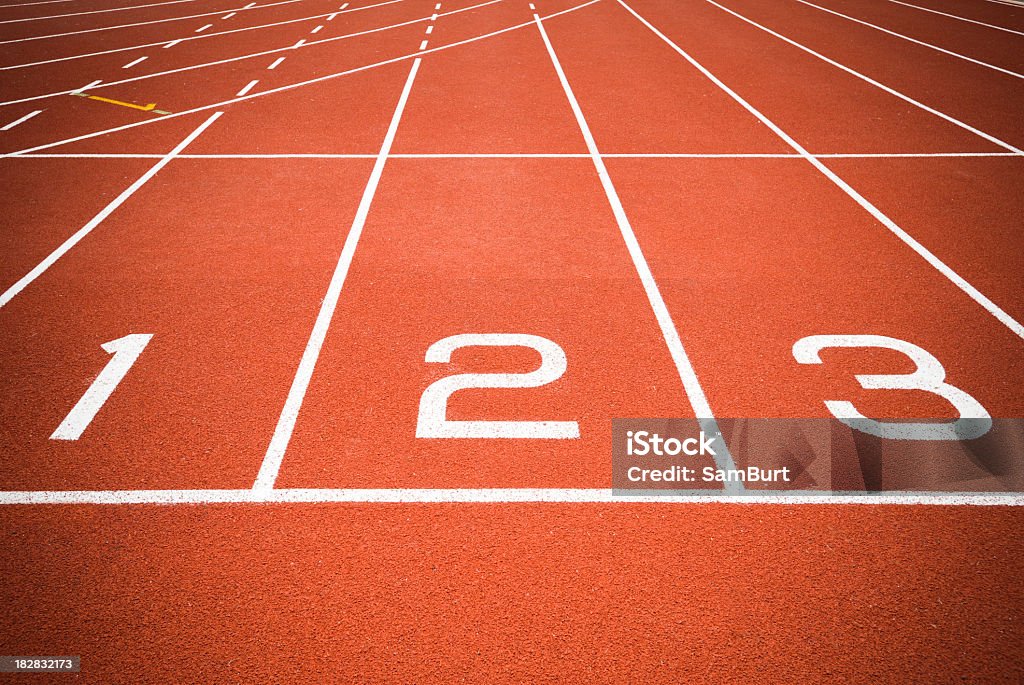 The first three startup lines for track The starting line on an all weather running track. Running Track Stock Photo