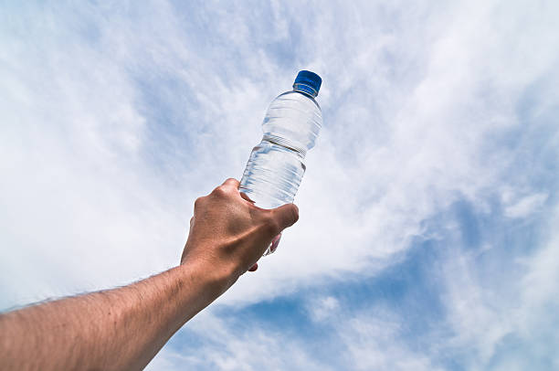 istock Hand holding a Bottle of Still water 182832231