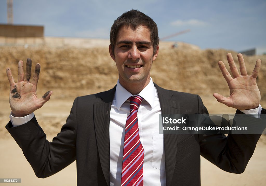 Homme d'affaires avec la main à la pâte - Photo de Costume habillé libre de droits