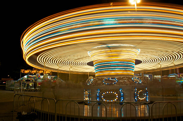 istock Motion Blur of Carnival Ride at Night 182833051