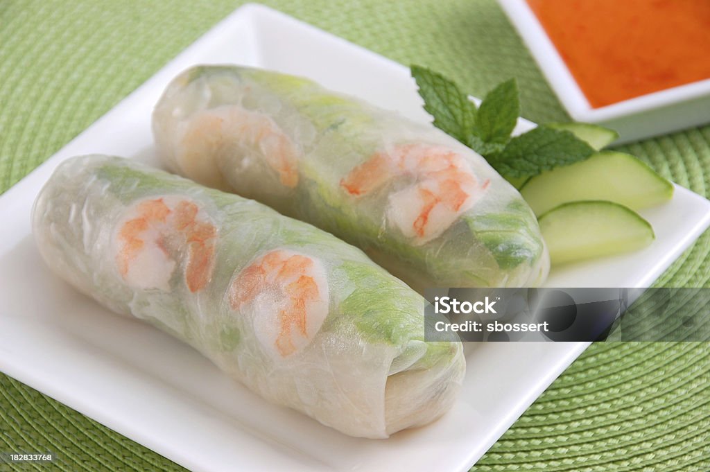 Vietnamese Fresh Spring Rolls "A refreshing appetizer of cold shrimp, vermicelli, lettuce, mint, and bean sprouts, wrapped in a rice paper roll.Another image from this series:" Spring Roll Stock Photo