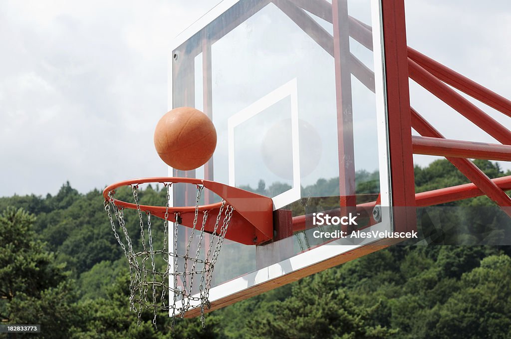 Basketball Hoop Basketball Hoop with ball in air. Back Board - Basketball Stock Photo