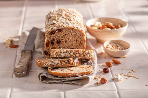 istock Fit delicacies bread with bran, raisins and nuts. 1828348686