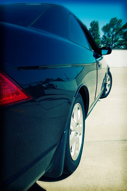 istock Back Side of black sports car effect 182835282