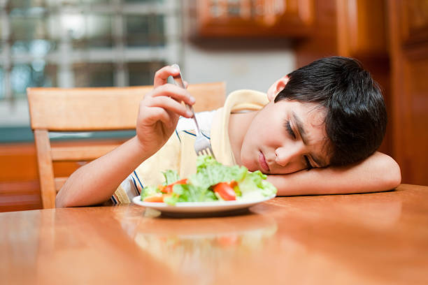 istock Boy disliking his food 182835420