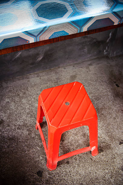 Red stool in road side cafe Bali Indonesia