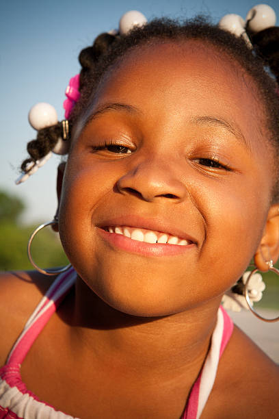 istock smiling young girl 182835608