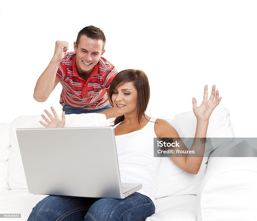 Jovem casal feliz na sala de estar - Foto de stock de 20 Anos royalty-free